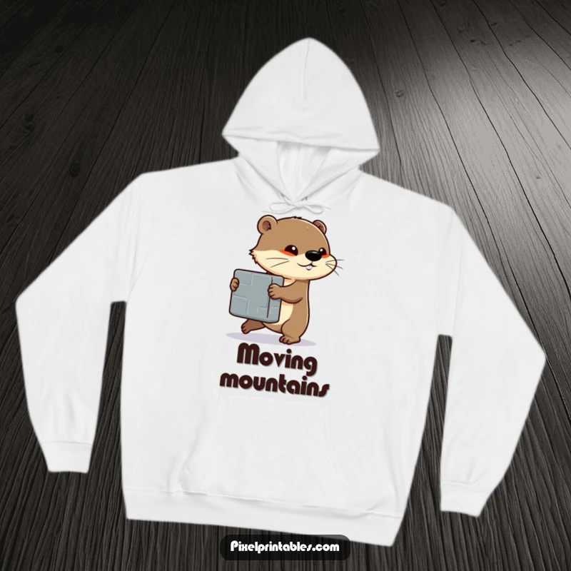Funny hoodie featuring a determined otter pushing a large pixelated block, offering warmth and a symbol of strength.